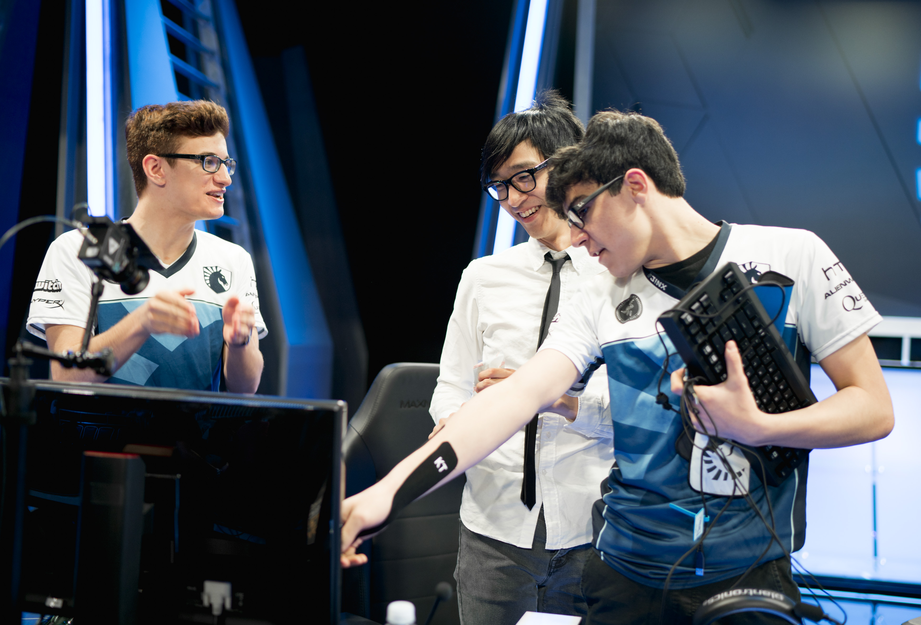 Locodoco smiles after defeating NRG with top laner Sam "Lourlo" Jackson and former jungler Joshua "Dardoch" Harnett. Photo via lolesports.com.