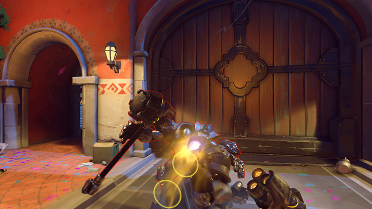 Reinhardt charging at an opponent, preparing to pin them against a wall and make them five kinds of dead.