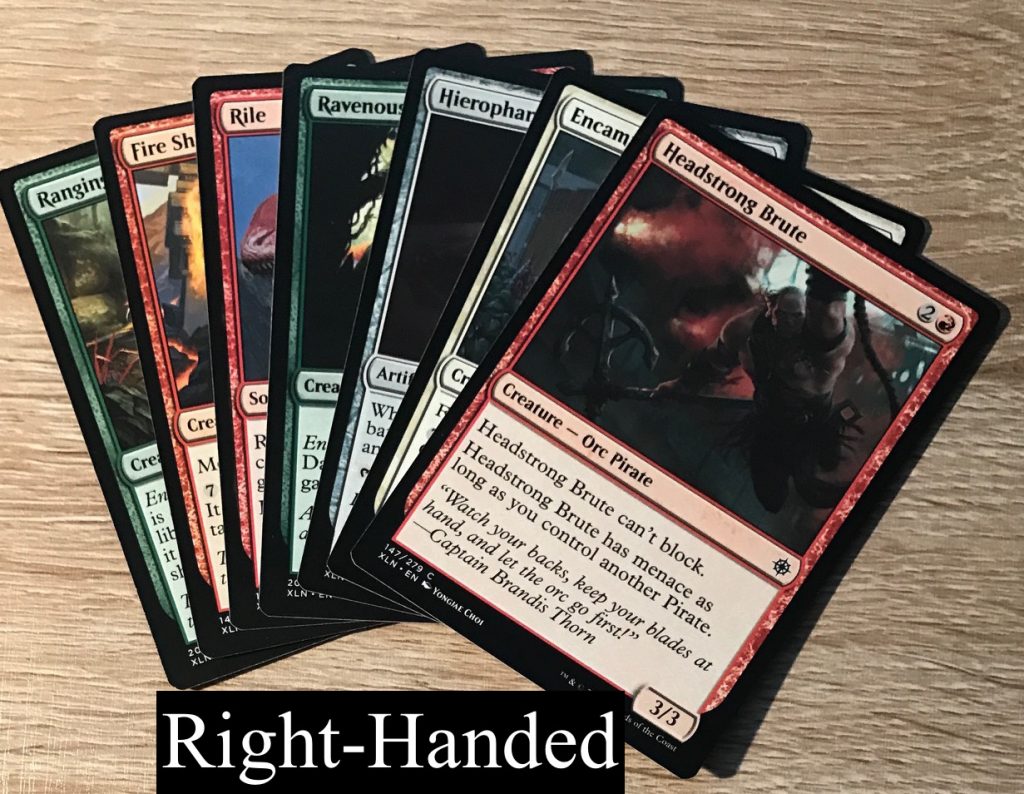 If you're a right-handed gamer, this is how you hold your Magic: the Gathering cards.